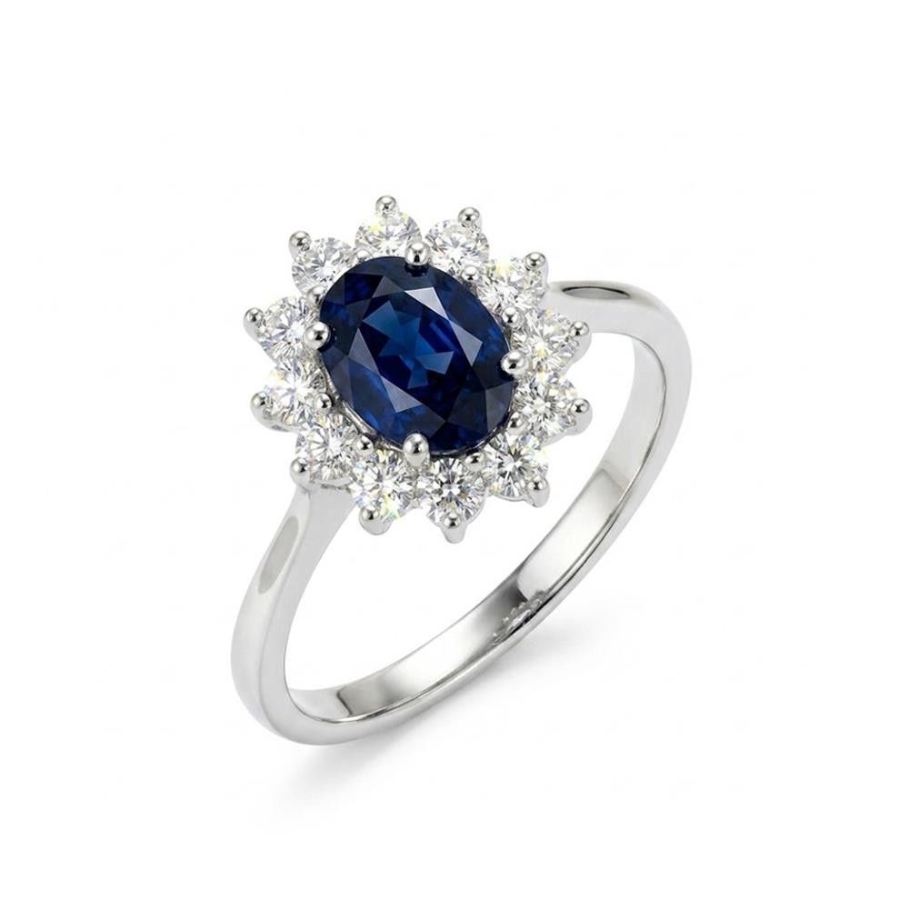 Anello in Oro Bianco 18 Kt con Cubic Blu Zaffiro e Bianchi