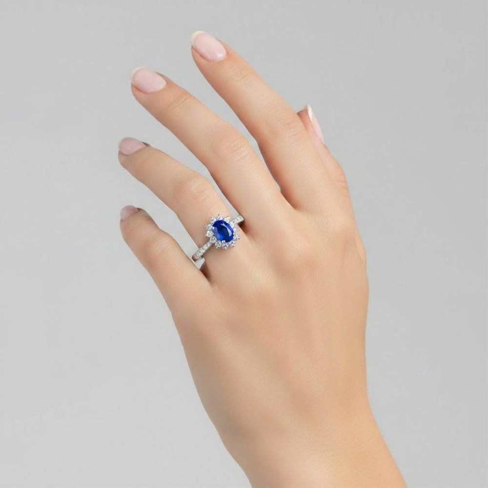 Anello Zaffiro Blu Taglio Ovale in Oro Bianco 18 Kt e Diamanti