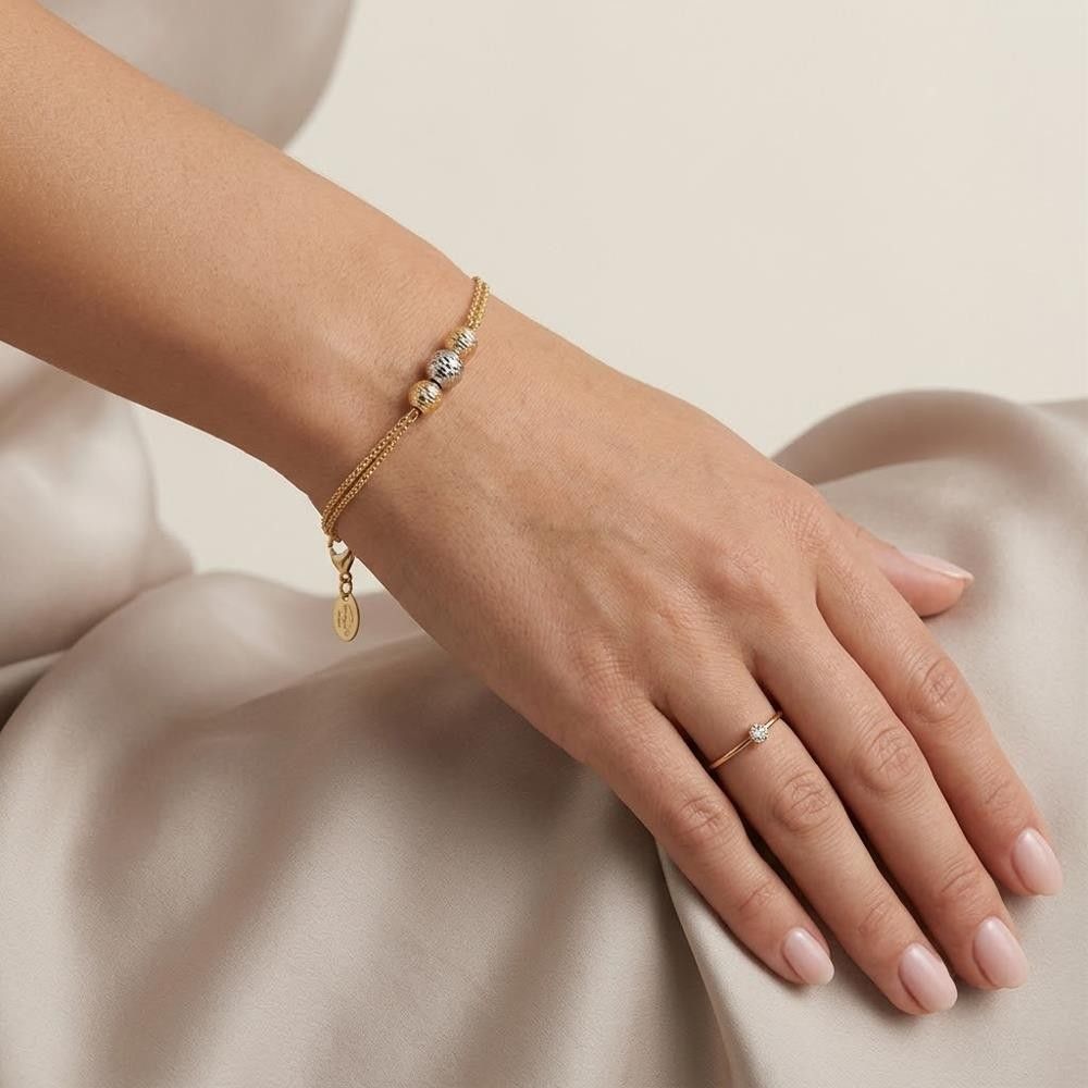 Bracciale con Palline in Oro Giallo e Bianco 18 Kt