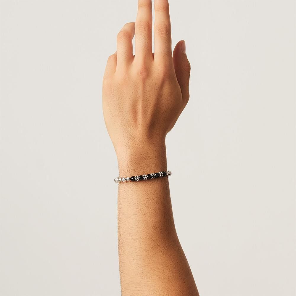 Bracciale Elastico In Argento Con Onice E Su Coccu – Artigianato Sardo Portafortuna