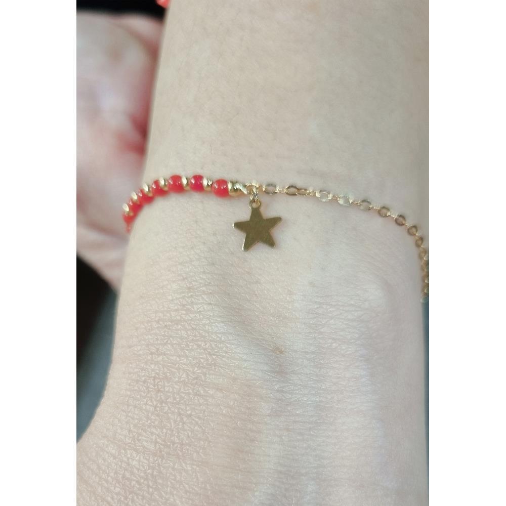 Bracciale in Oro Giallo 18 kt Stella e Pasta di Corallo