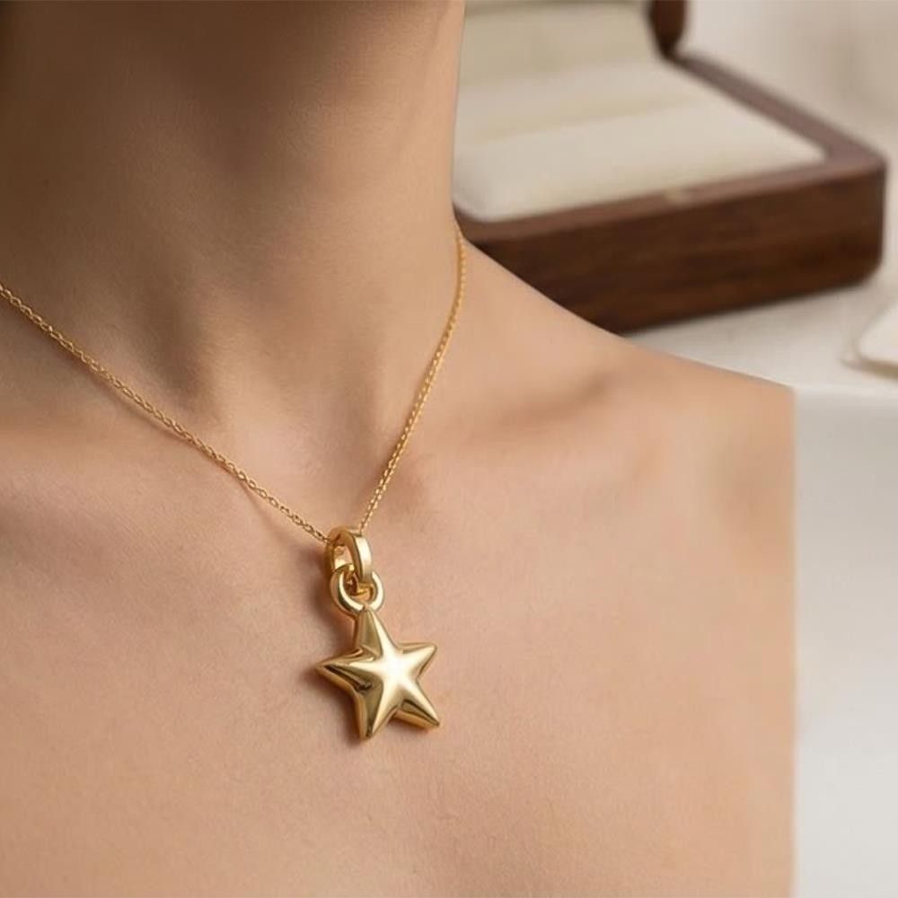 Ciondolo Stella in Oro Giallo 18 Kt