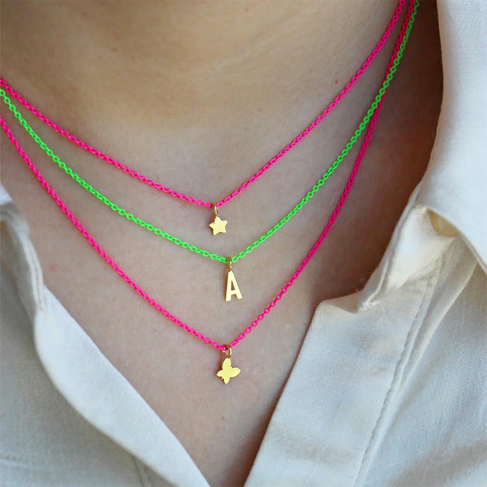 Girocollo Rue Des Mille Oro 18 KT Farfalla Rosa Fluo