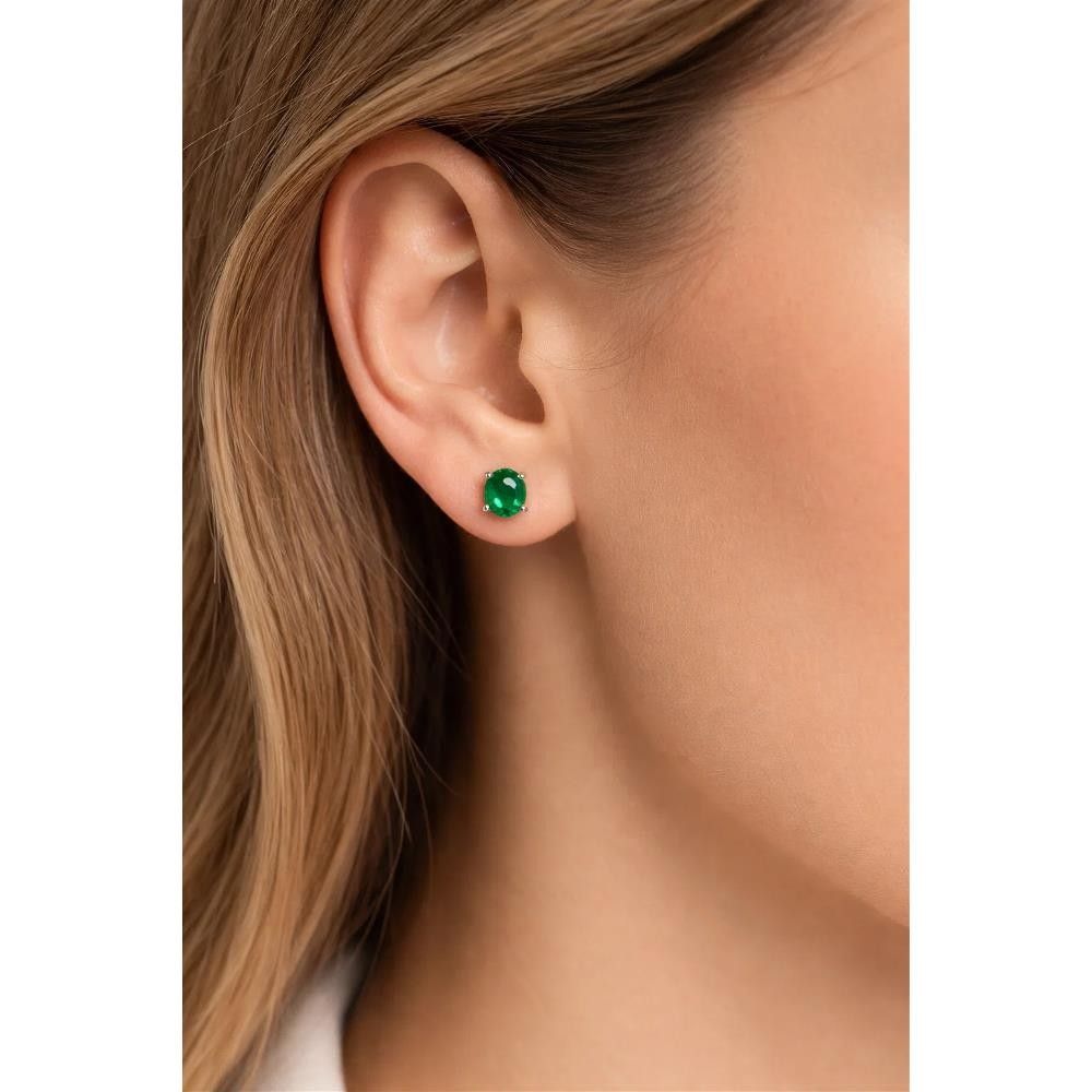 Orecchini Punto Luce in Oro Bianco 18 Kt e Smeraldo